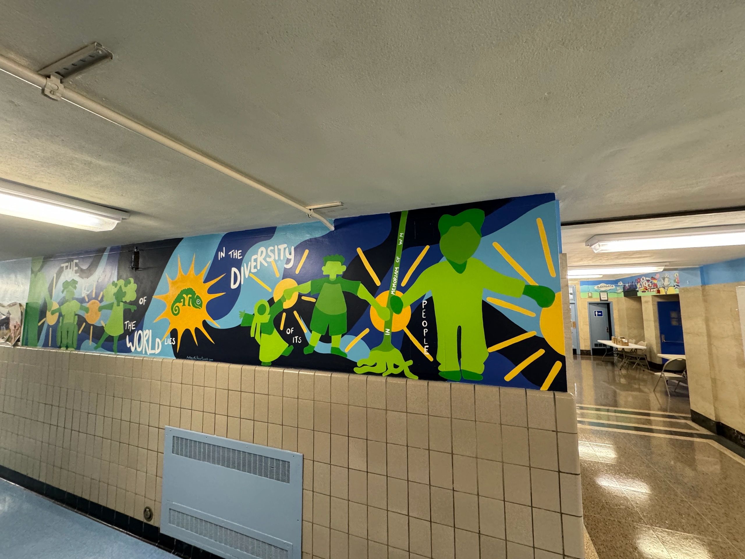 Diversity mural with colorful silhouettes — community project